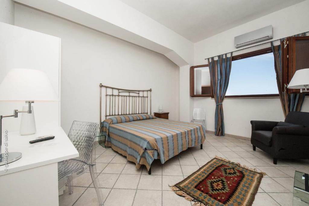 Postel nebo postele na pokoji v ubytování Casale Belvedere vista mare