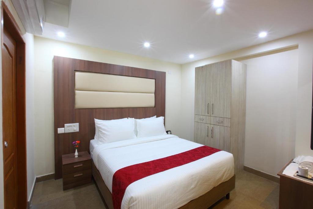 Postel nebo postele na pokoji v ubytování Laimar Suites