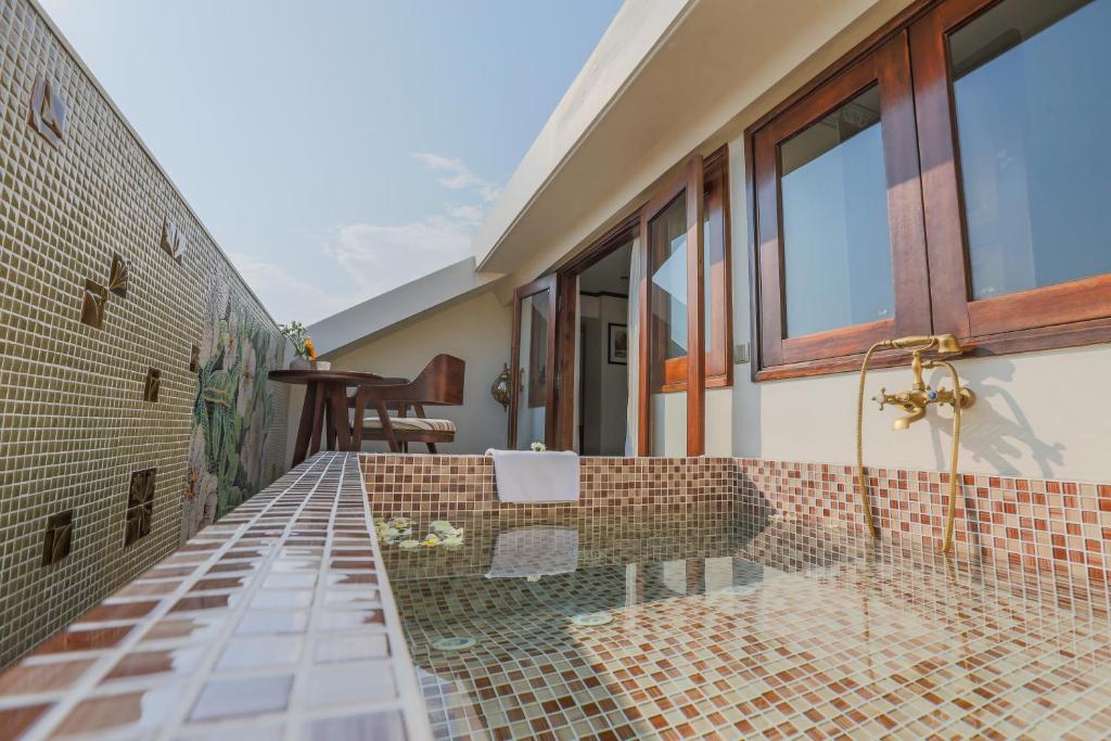 Balkón nebo terasa v ubytování Almanity Hoi An Resort & Spa