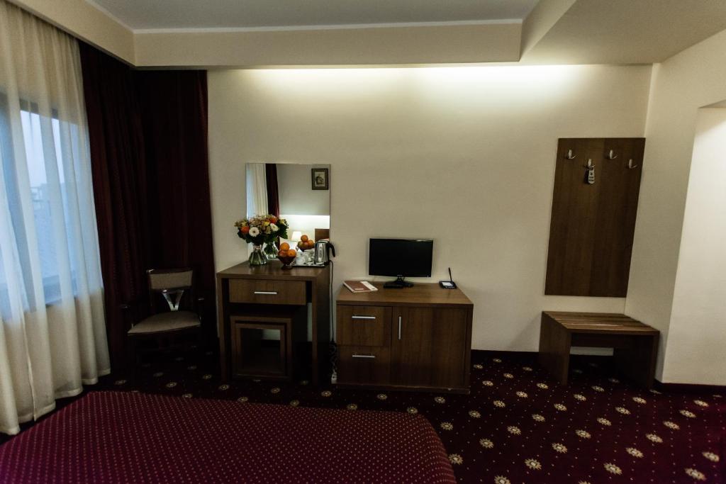 TV a/nebo společenská místnost v ubytování Hotel Ferdinand