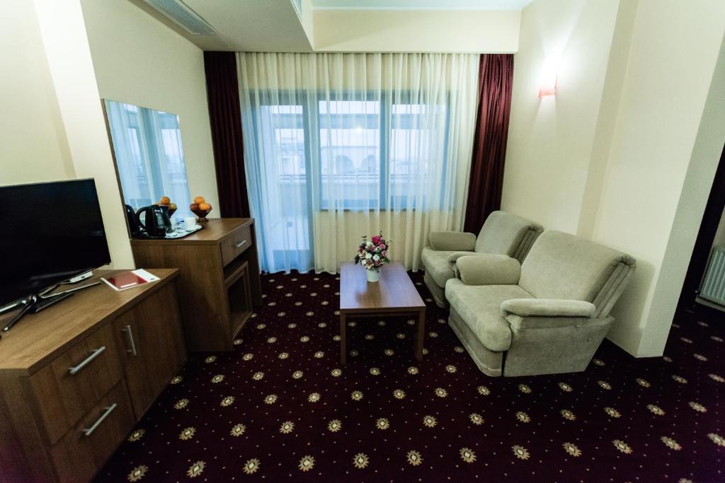 TV a/nebo společenská místnost v ubytování Hotel Ferdinand
