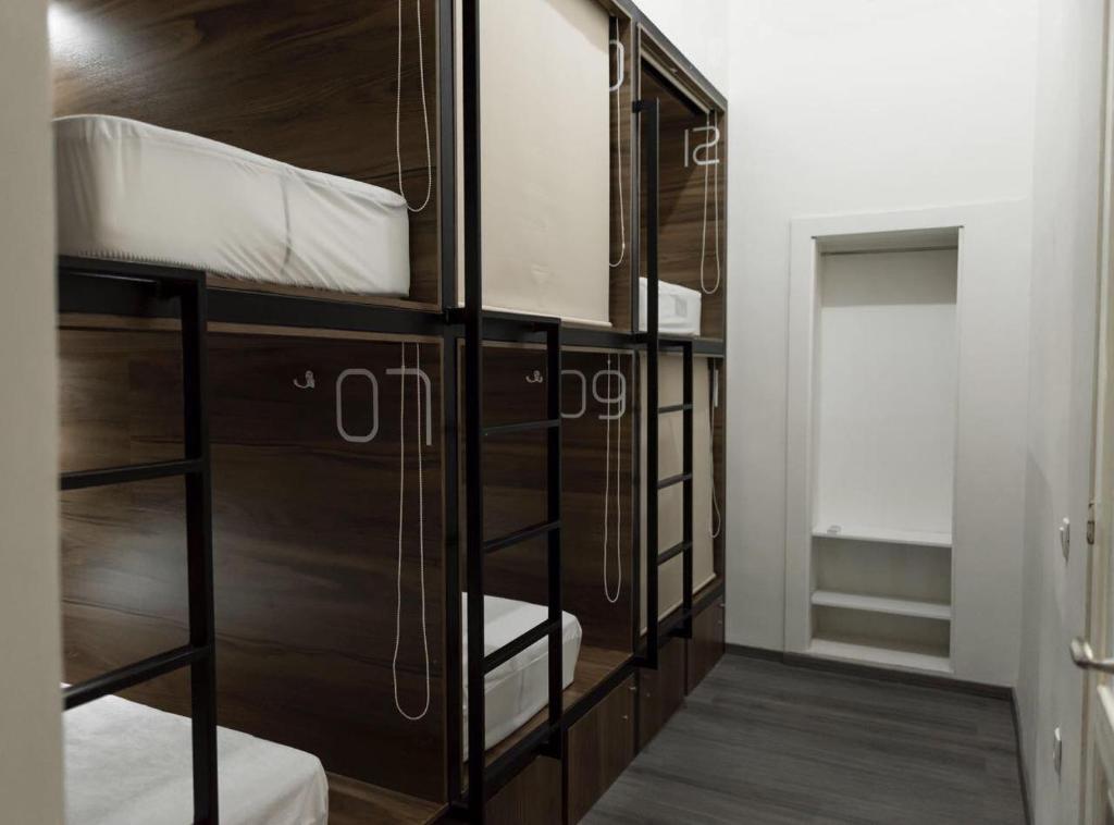 Postel nebo postele na pokoji v ubytování Kumba Hostel