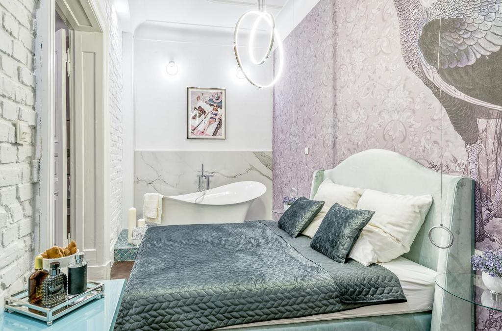 Posteľ alebo postele v izbe v ubytovaní Apartamenty "ArtAparts" Stare Miasto - Centrum