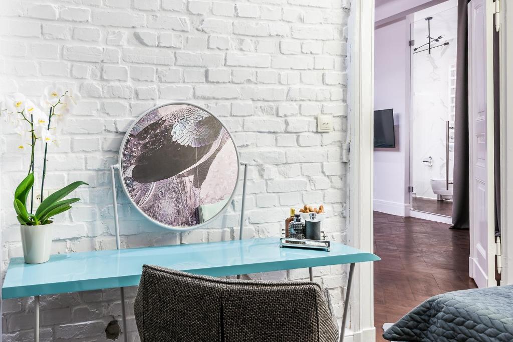 Televízia a/alebo spoločenská miestnosť v ubytovaní Apartamenty "ArtAparts" Stare Miasto - Centrum