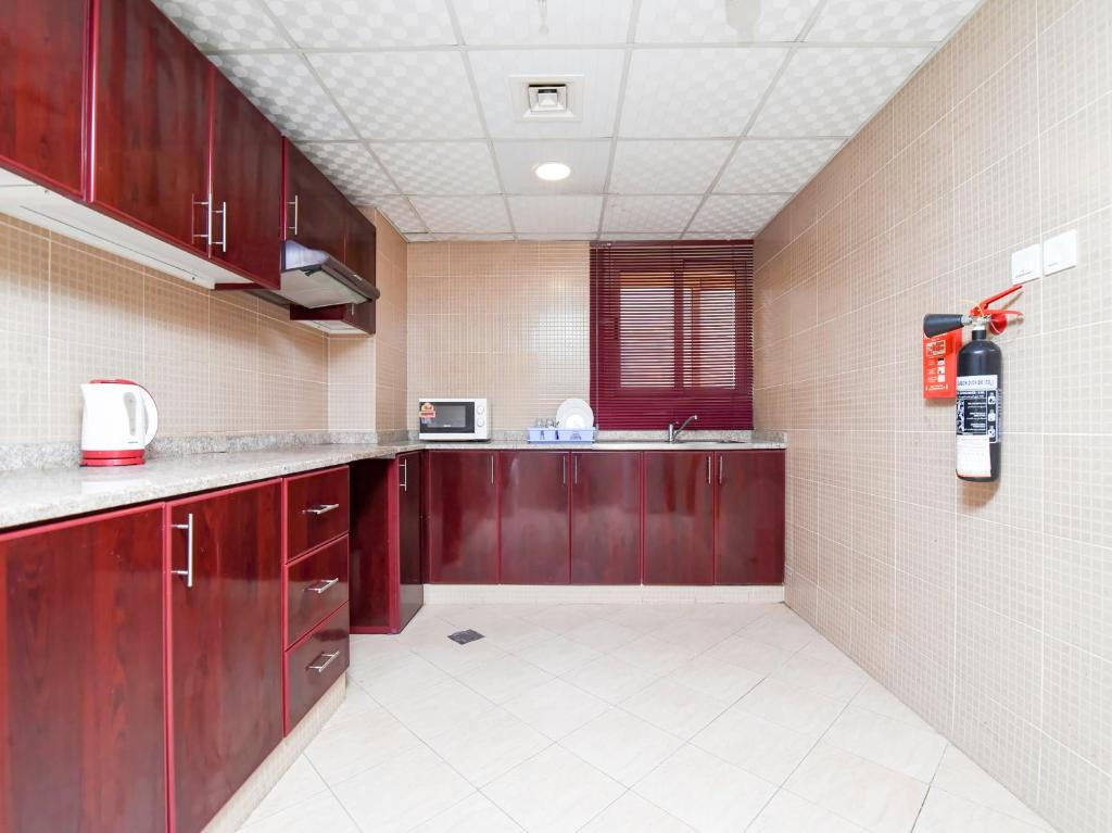 Kuchyň nebo kuchyňský kout v ubytování Paradise Inn 1 Tabasum Group