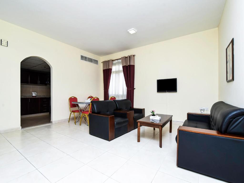 Posezení v ubytování Paradise Inn 1 Tabasum Group