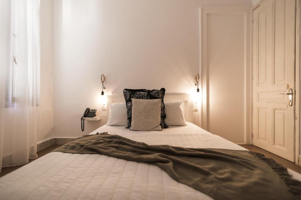 Postel nebo postele na pokoji v ubytování Kumba Hostel