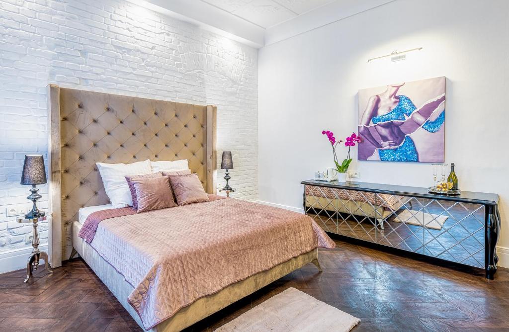 Posteľ alebo postele v izbe v ubytovaní Apartamenty "ArtAparts" Stare Miasto - Centrum