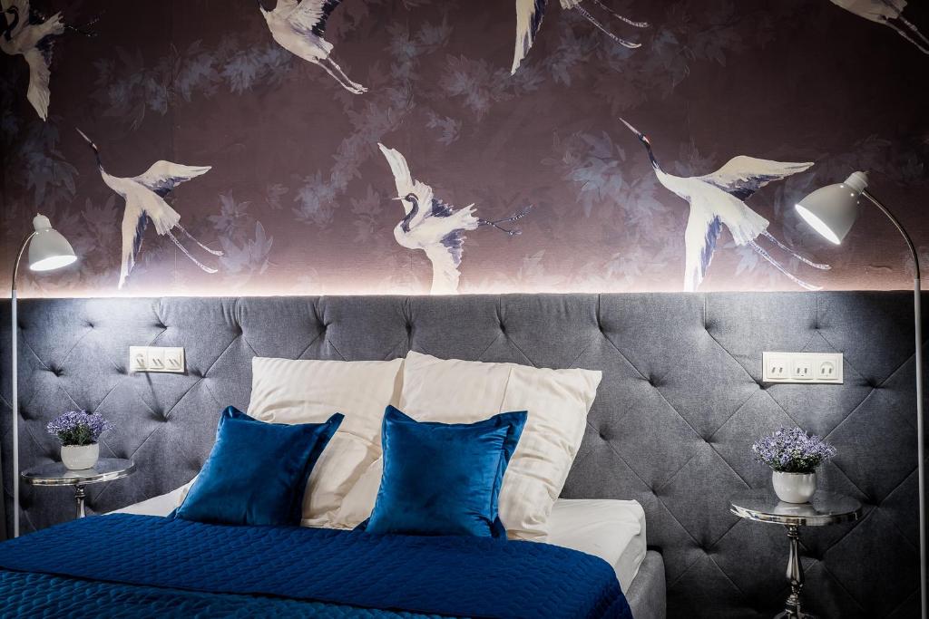 Posteľ alebo postele v izbe v ubytovaní Apartamenty "ArtAparts" Stare Miasto - Centrum