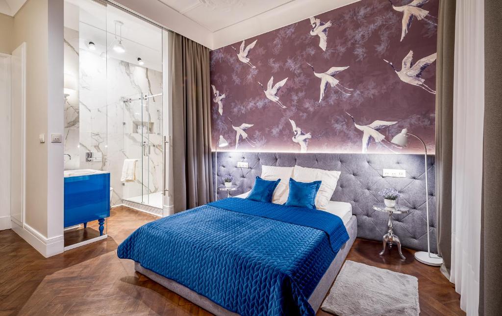Posteľ alebo postele v izbe v ubytovaní Apartamenty "ArtAparts" Stare Miasto - Centrum