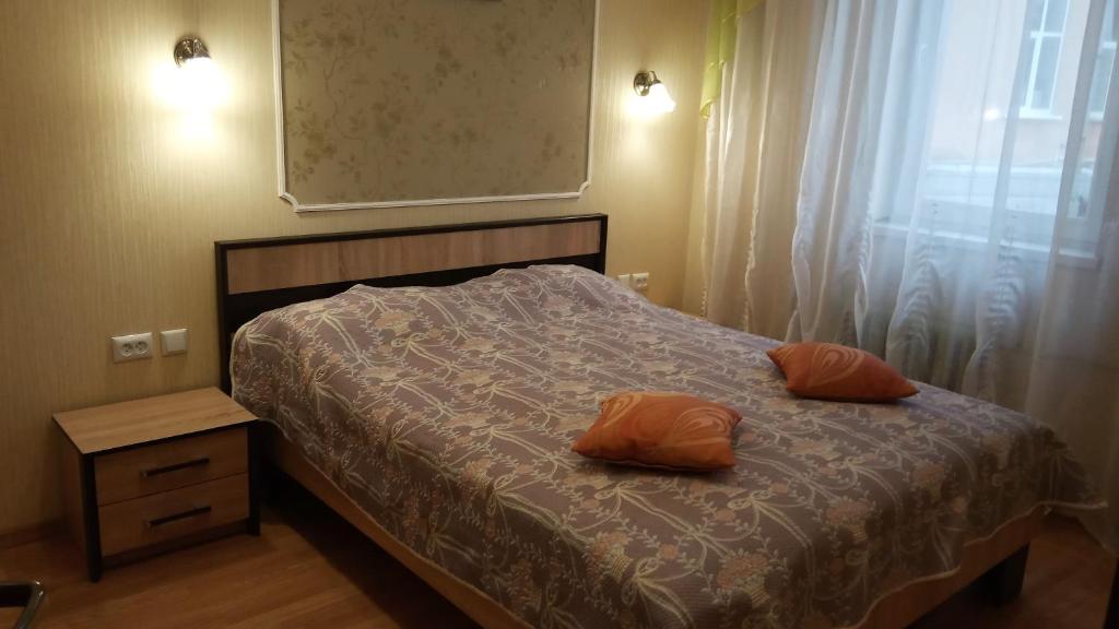 Postel nebo postele na pokoji v ubytování Сонячна
