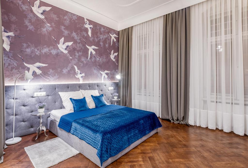 Posteľ alebo postele v izbe v ubytovaní Apartamenty "ArtAparts" Stare Miasto - Centrum
