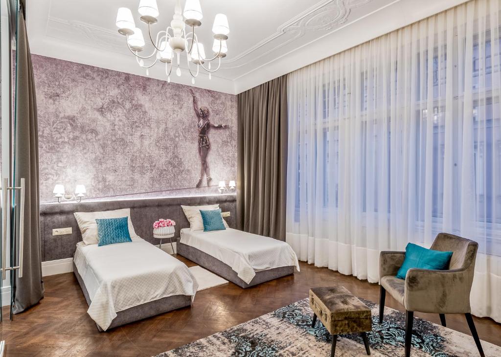 Posteľ alebo postele v izbe v ubytovaní Apartamenty "ArtAparts" Stare Miasto - Centrum