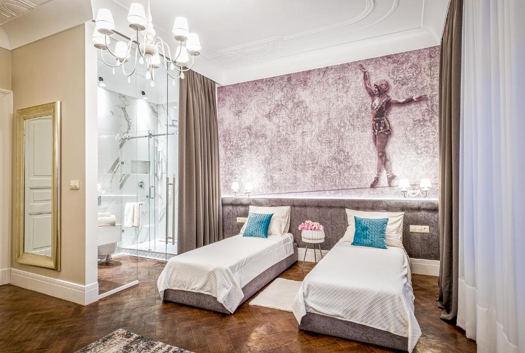 Posteľ alebo postele v izbe v ubytovaní Apartamenty "ArtAparts" Stare Miasto - Centrum