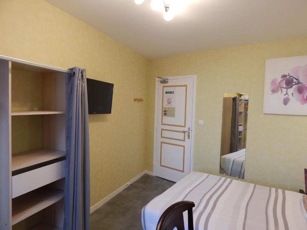 Postel nebo postele na pokoji v ubytování Le Lion D'or
