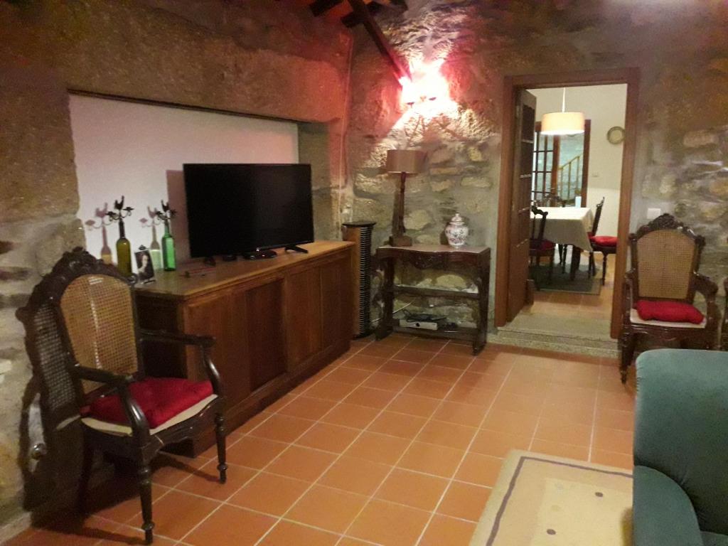 TV a/nebo společenská místnost v ubytování Casa da Farmácia