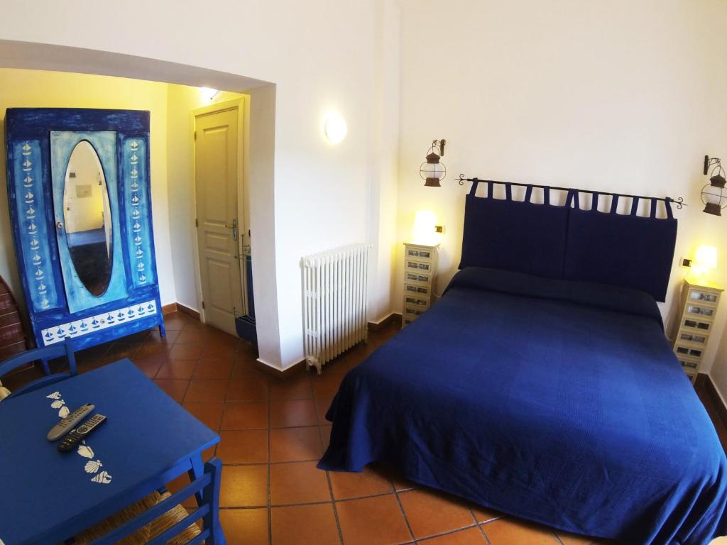 Voodi või voodid majutusasutuse Agriturismo Terre di Mare Bordighera toas