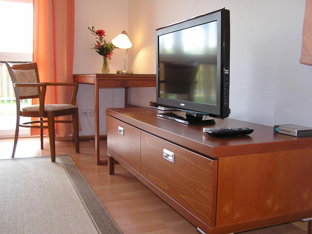 TV a/nebo společenská místnost v ubytování Gonda Apartments