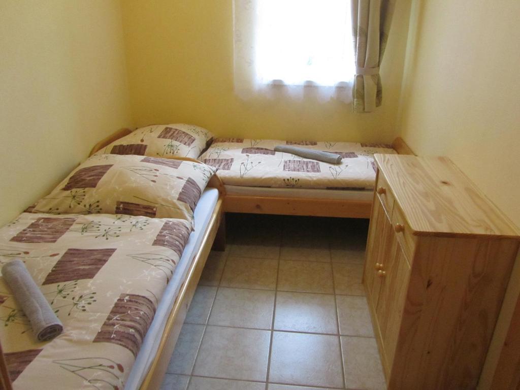 Postel nebo postele na pokoji v ubytování Vila Horal