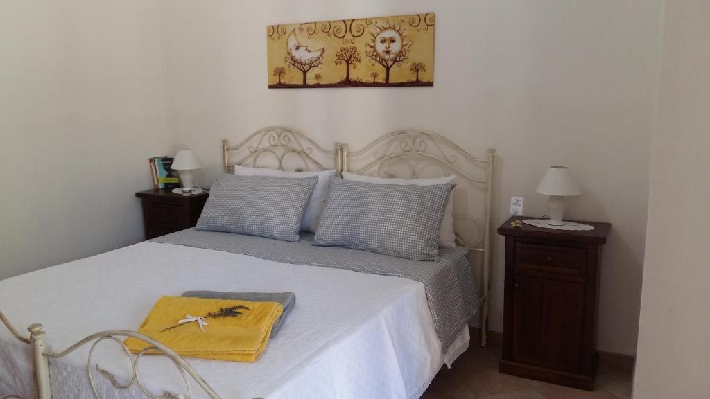Postel nebo postele na pokoji v ubytování Agriturismo Le Scerze