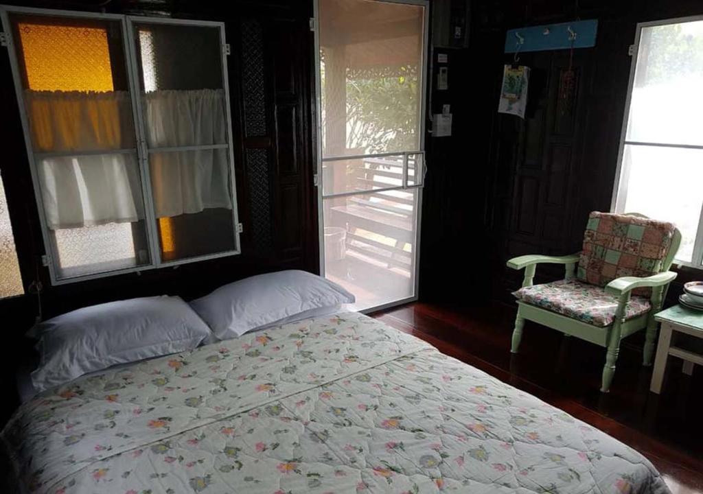 Postel nebo postele na pokoji v ubytování Sichang My home