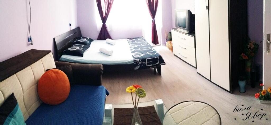 Postel nebo postele na pokoji v ubytování Hotel Yavor