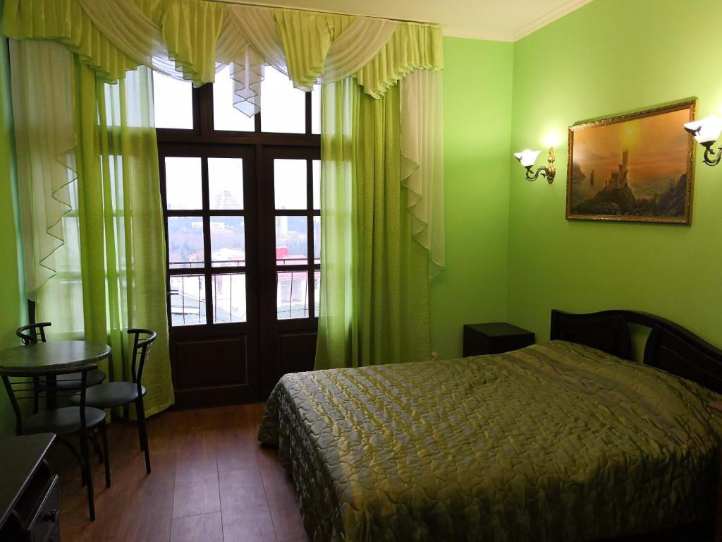 Cama o camas de una habitación en Guest House Viola