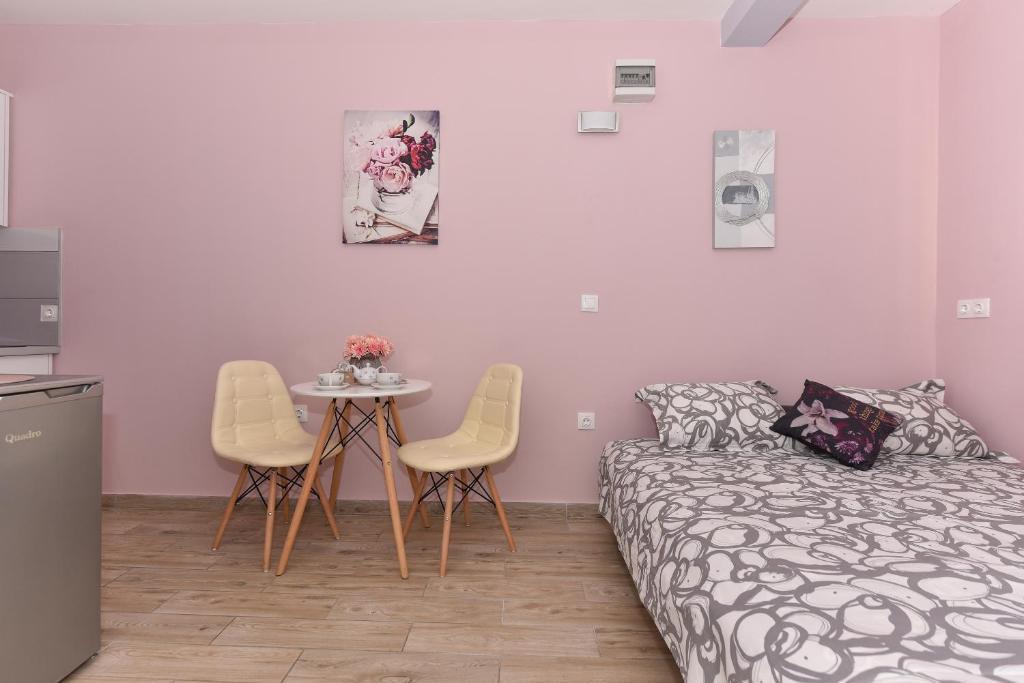 Postel nebo postele na pokoji v ubytování Studio Apartment Deluxe