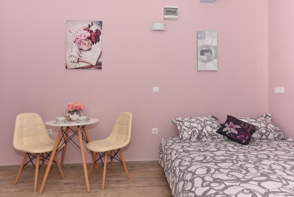 Postel nebo postele na pokoji v ubytování Studio Apartment Deluxe