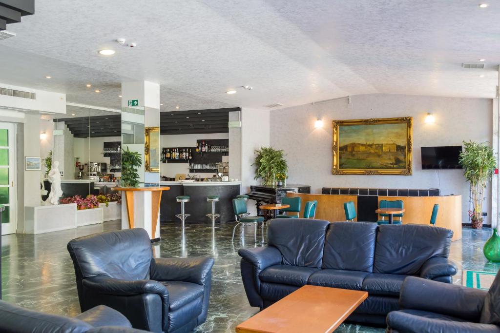 Kuchyň nebo kuchyňský kout v ubytování Hotel Plaza con piscina