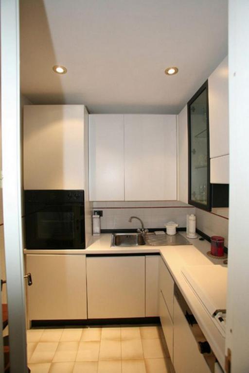A kitchen or kitchenette at Appartamento a Palazzo Vinci