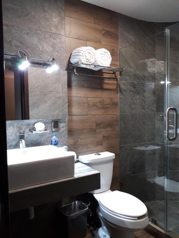Koupelna v ubytování Hotel Corral Grande