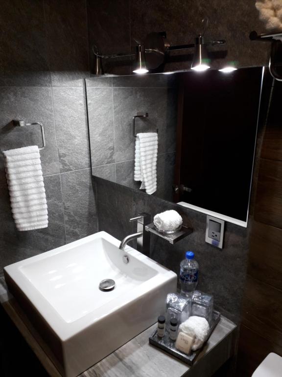 Koupelna v ubytování Hotel Corral Grande