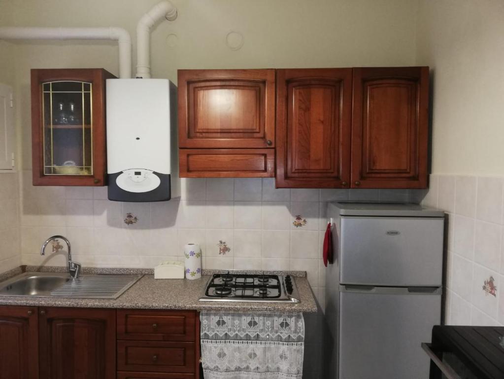 Kuchnia lub aneks kuchenny w obiekcie Ortensia - Sanremo Apartments