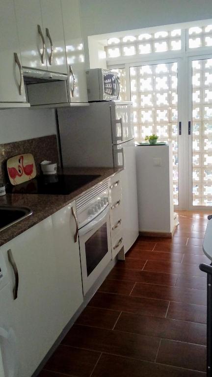 Kuchyň nebo kuchyňský kout v ubytování Apartamento "SOLAZ"