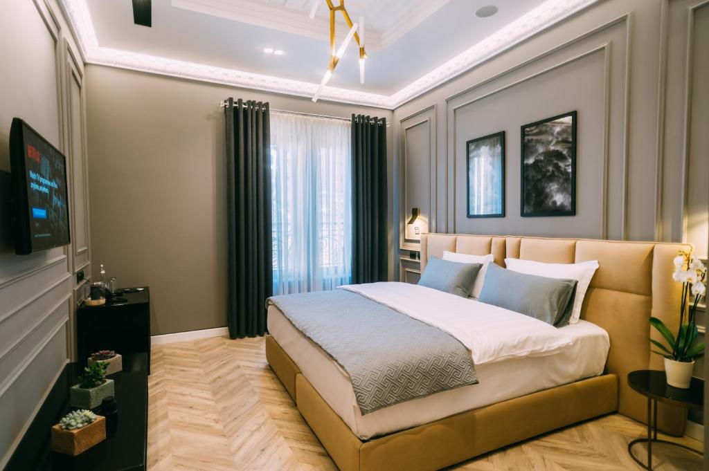 Postel nebo postele na pokoji v ubytování Hotel Stela Center