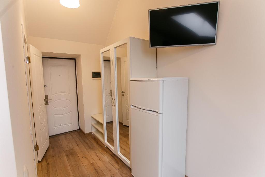 TV a/nebo společenská místnost v ubytování Smart Apart