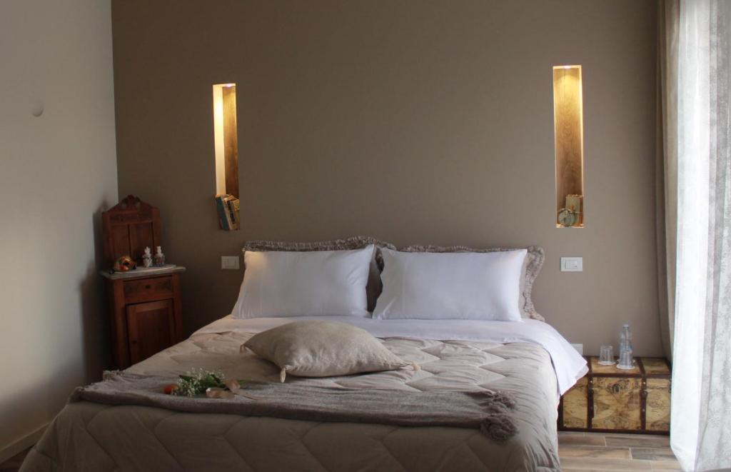 Postel nebo postele na pokoji v ubytování Un sogno B&B