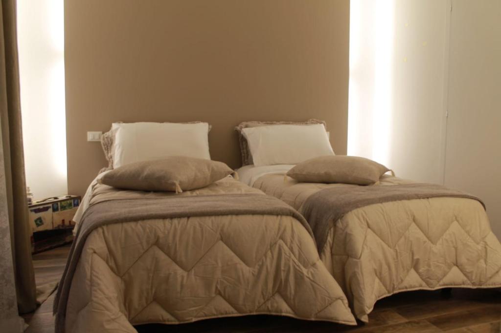 Postel nebo postele na pokoji v ubytování Un sogno B&B