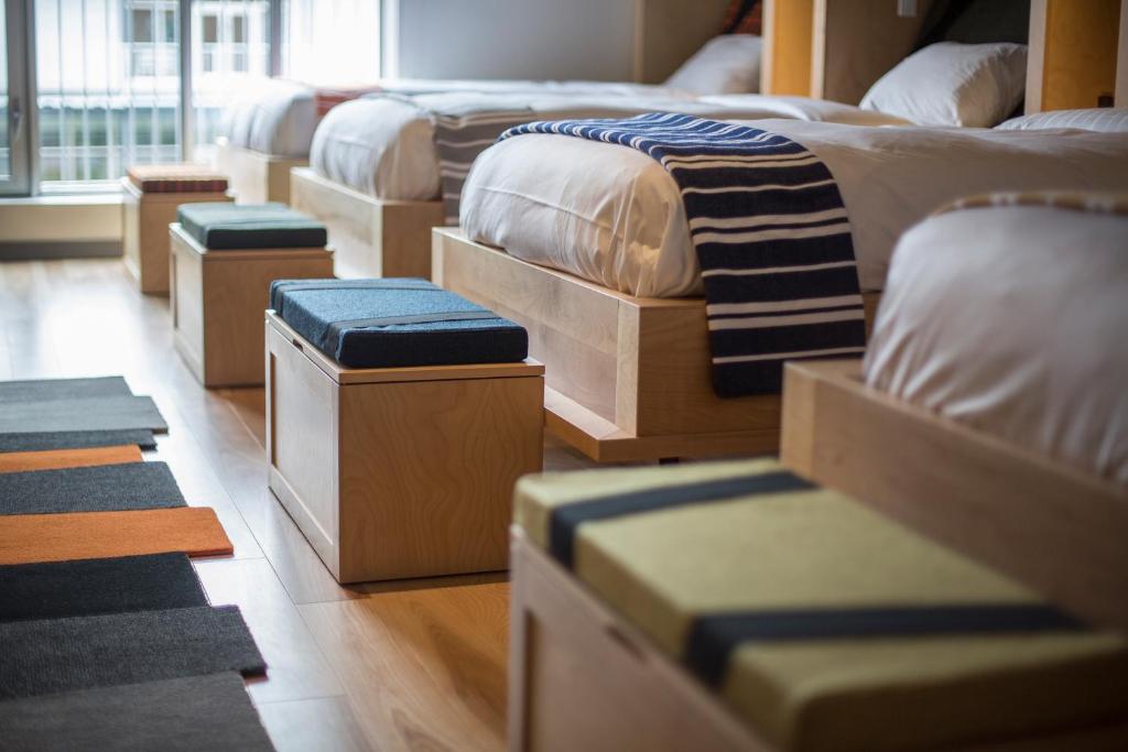 Postel nebo postele na pokoji v ubytování Hôtel & Spa Le Germain Charlevoix