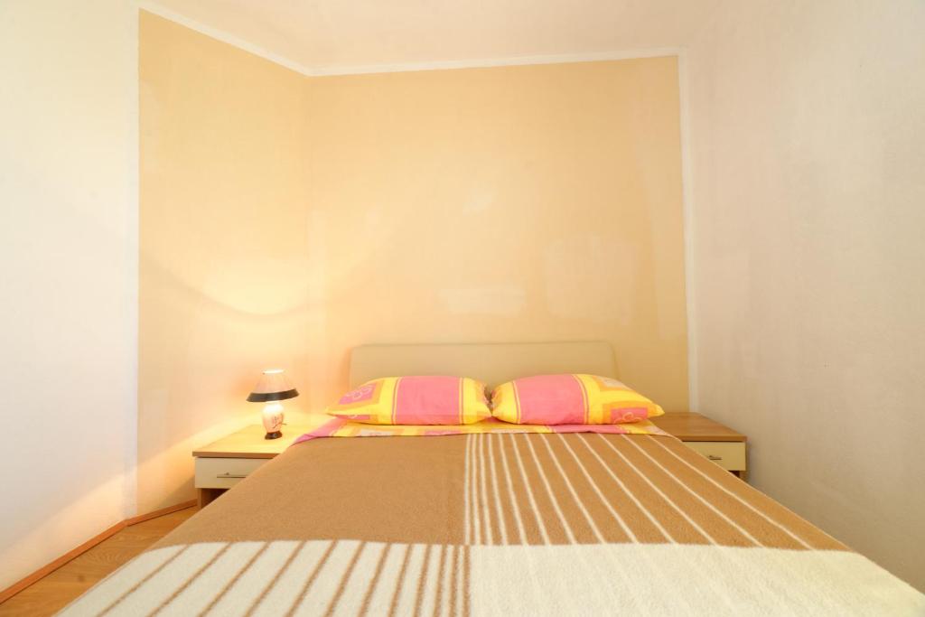 Posteľ alebo postele v izbe v ubytovaní Borik Apartment Pedic