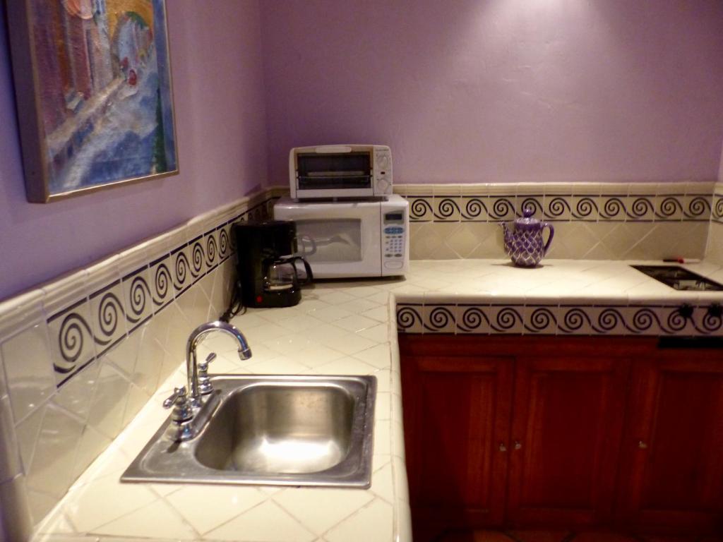 Kuchyň nebo kuchyňský kout v ubytování Casa Carly