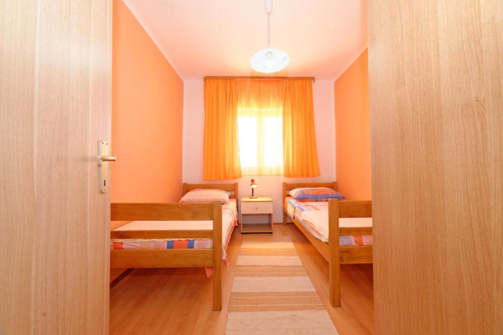 Posteľ alebo postele v izbe v ubytovaní Borik Apartment Pedic