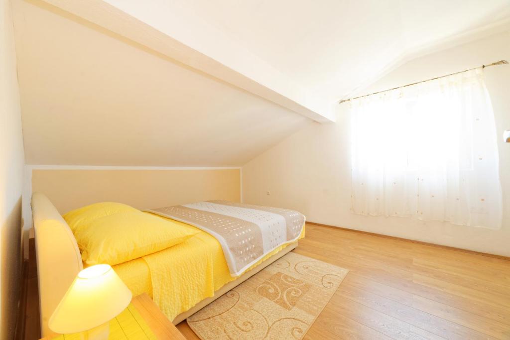 Posteľ alebo postele v izbe v ubytovaní Borik Apartment Pedic