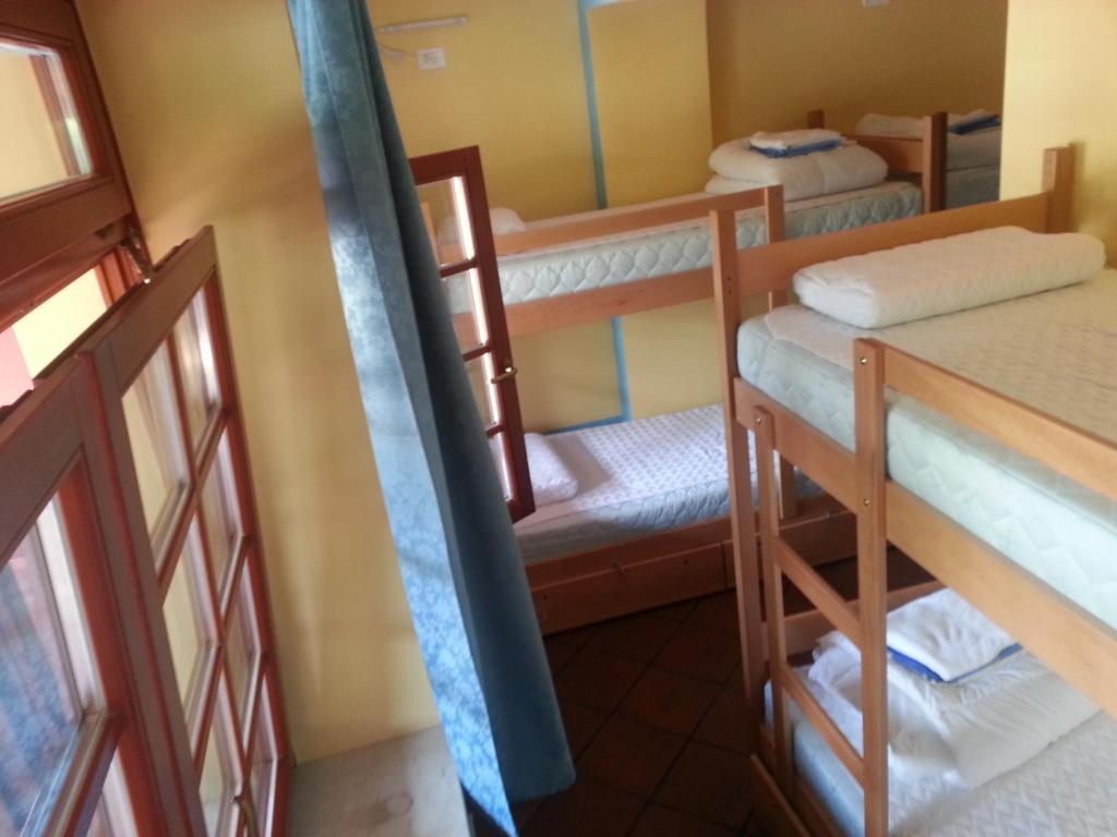 Postel nebo postele na pokoji v ubytování Europa Hostel Portorož