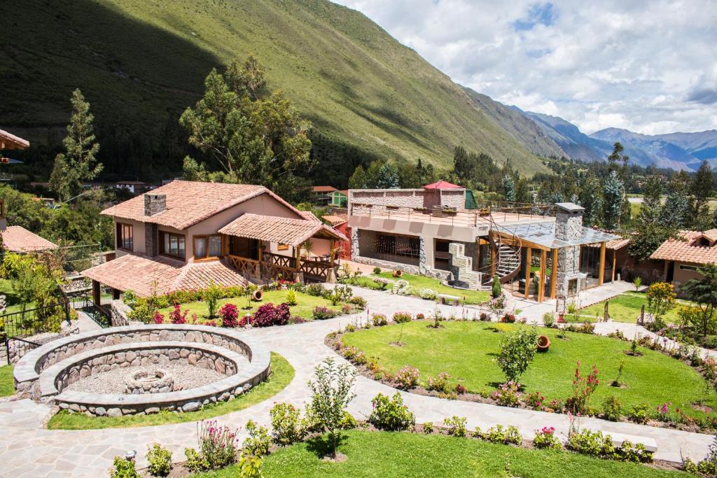 an aerial view of a house with a garden at Intiterra Apart Hotel Villas in Urubamba