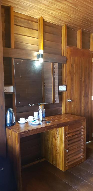 Kuchyň nebo kuchyňský kout v ubytování Wilpattu Tree House