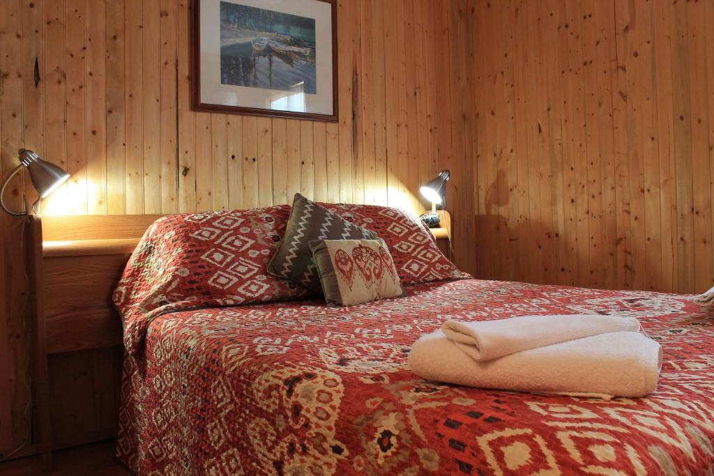 Postel nebo postele na pokoji v ubytování Lac Des Roches Resort