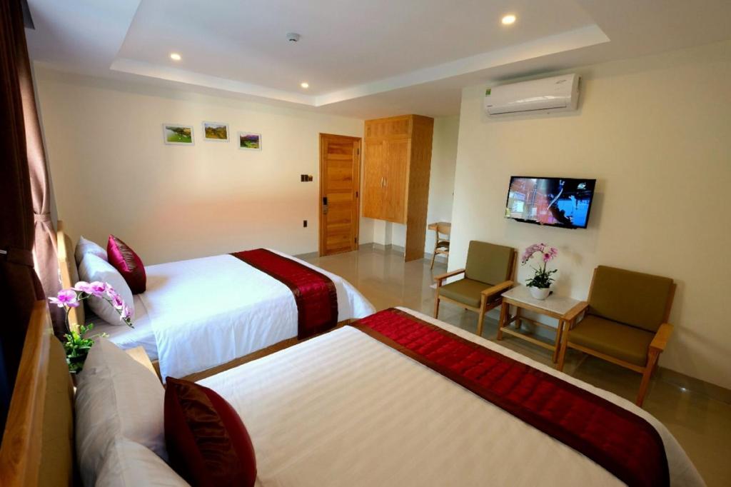 Marigold Hotel & Apartment - Triple Room With Balcony