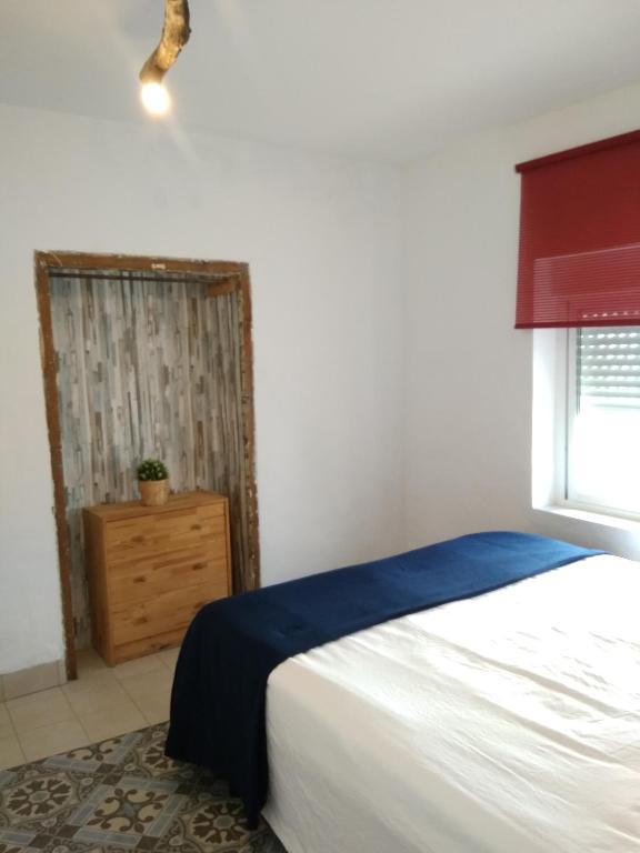Posteľ alebo postele v izbe v ubytovaní Conil Homes III Apartments